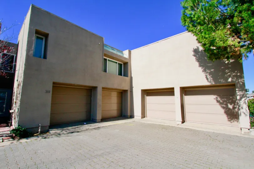 Facade, modern architectural design, featuring dual garage, Bay View Terrace, Costa Mesa, California