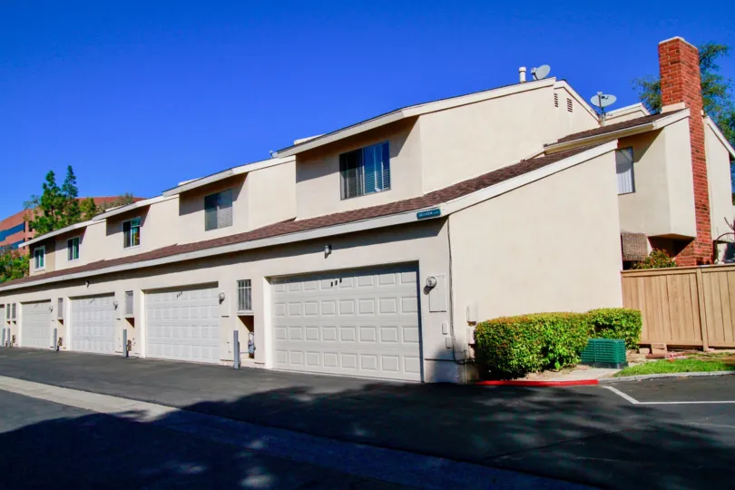 An apartment complex on a sunny day at the Brookview Community in Costa Mesa, Ca.