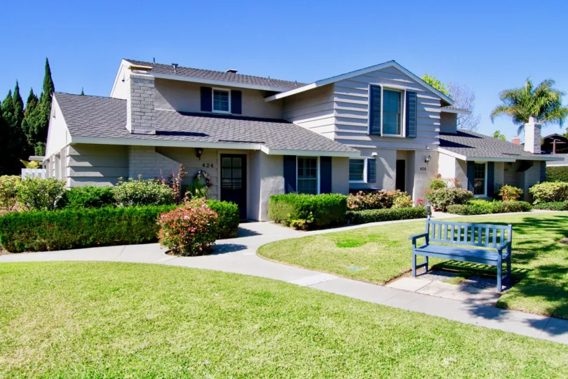 Cape Series Costa Mesa California amazing structure with sequencial homes with trees at back