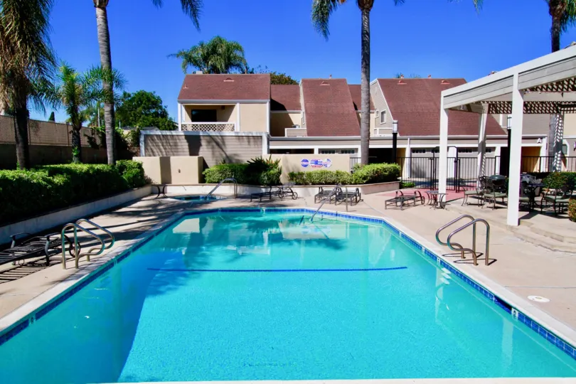 A beautiful day at the Cedar Glen Townhomes with a beautiful pool and room to sunbathe!