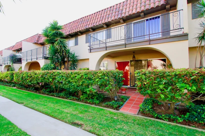 A beautiful red clay roof along the top of the Country Club Villas community