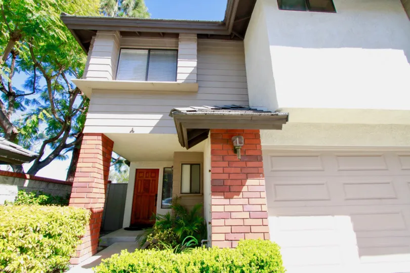 Beautifuly sun-lit photo of a home in the pleasant community of Elden Shadows in Costa Mesa, California.