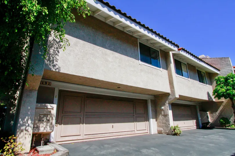 Fairview Village Costa Mesa California factory like appearance with long road with glassy window
