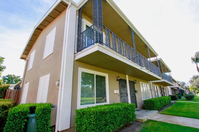 The gorgeous wrought iron entrances with lush landscapes in the community of French Quarters in Costa Mesa, California.