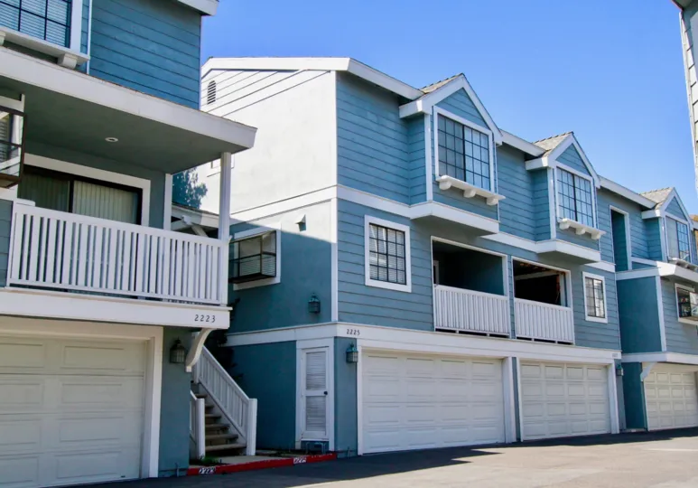 The home in the Garden Park village is very elegant look with row houses in that street full of row houses with sheds.