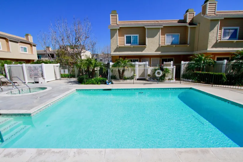 Poolside beautiful view hot tube and chairs at Ocean Breeze Villas located in Costa Mesa, California