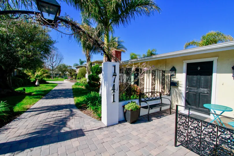 Walkway and gate of Orleans Townhouse community in Costa Mesa, CA