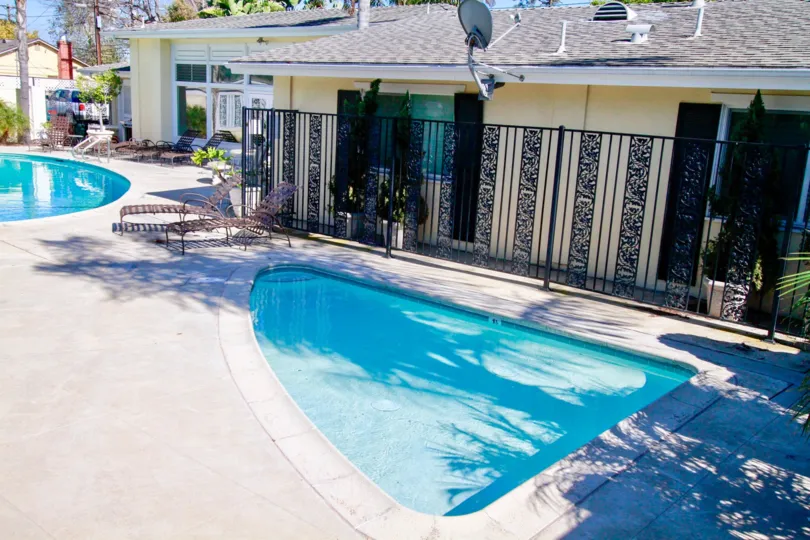 The home in the Orlean Townhouse with swimming pools its look like a restaurant with lots of trees and plants and also with nature atmosphere.