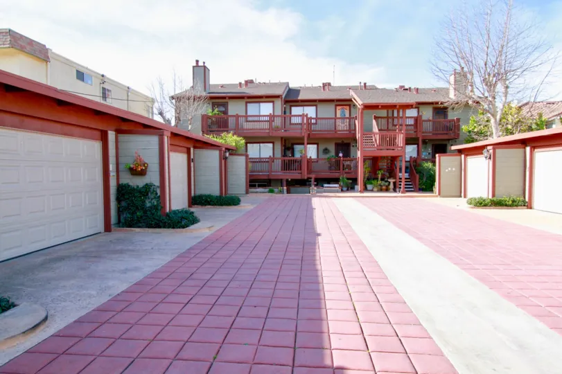 The blue sky above the red porches of the Pacific View community