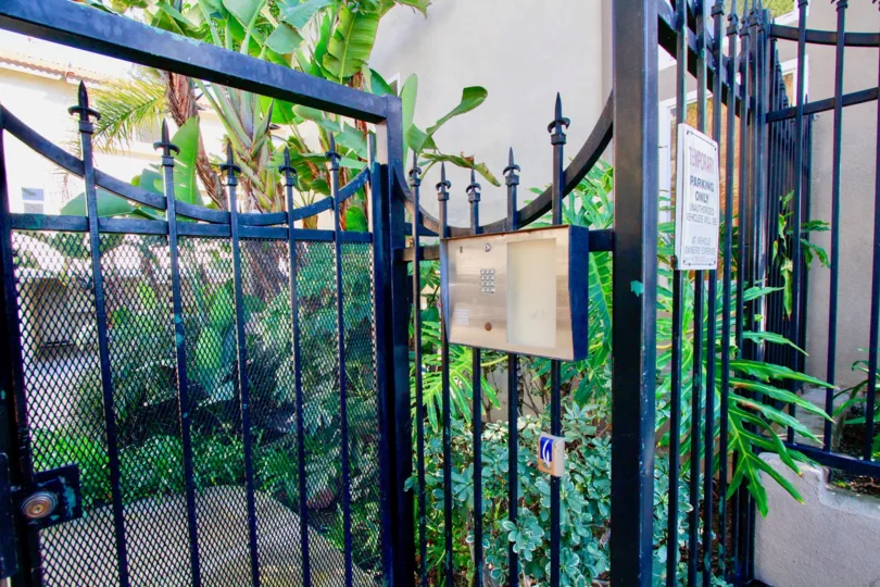 The gated entrance and the intercom to Palermo Townhomes in Costa Mesa, California
