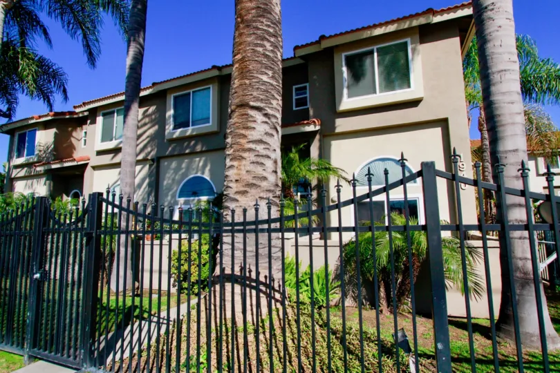 Palermo Townhomes Costa Mesa California house fully cover the font side gate near to garden