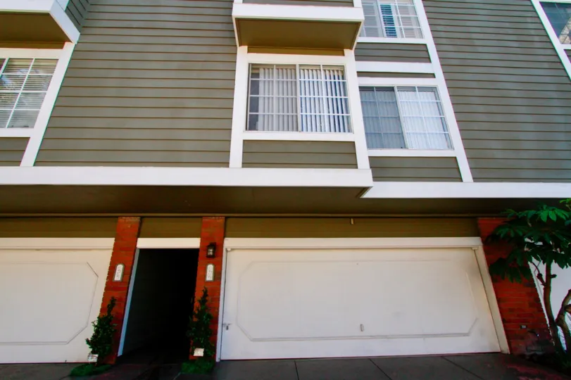 Pentridge Cove I apartment building with garages and a door.