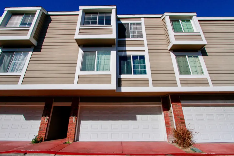 Pentridge Cove II Costa Mesa California building walk street very clean house paint light brown line shape very nice