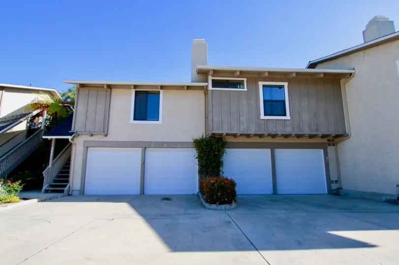 The houses in the Pepper tree heights is look like a cottage houses with trees and colorful plants with flowers.