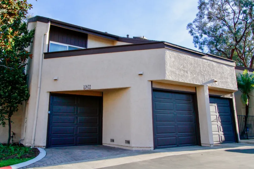 multistory home with three garages and patio on top of the garage located in Sommerset
