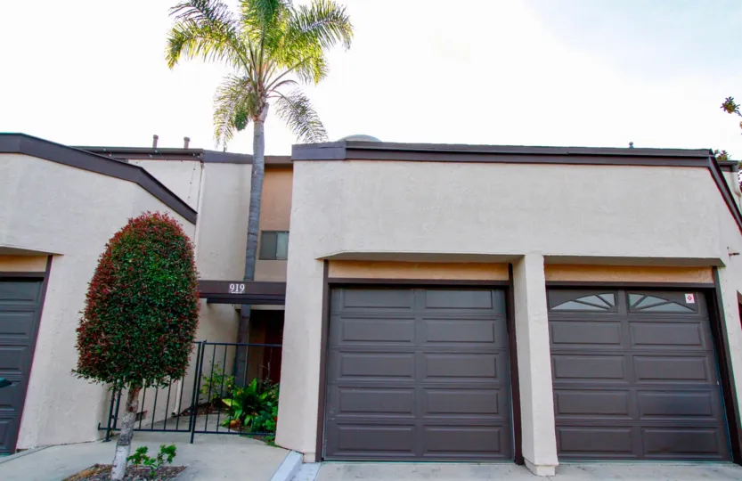 Two door garage with brown doors inside Sommerset at Costa Mesa CA