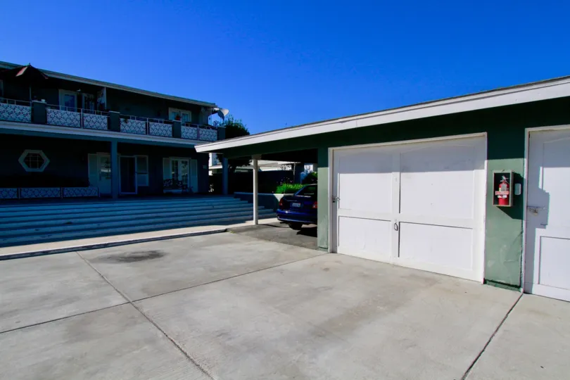 A parked car near the garages at The Vendome in Costa Mesa, CA