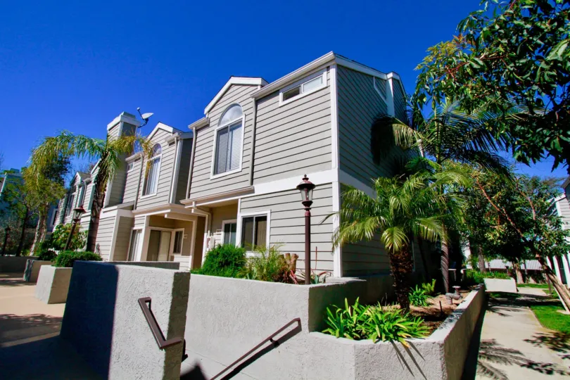 A sunny day in the Victoria Garden Villas is like a palace fully residential area with lots of trees in the street.