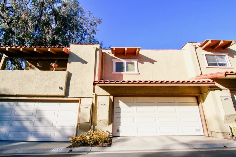 Westbluff Village Costa Mesa California bullding front side very large gate attached sun shine come to stright in the house