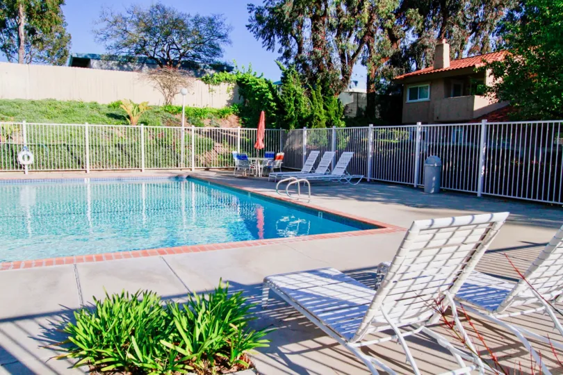 Westbluff Village Costa Mesa California house near swimming pool cover gate blue water