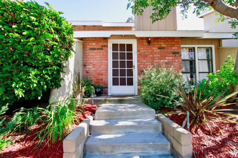Woodstream Condos Costa Mesa California building fully brick color paint ant some time place only black color very super house stright to come steps very clean