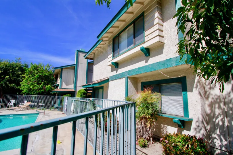 A view of the pool and an adjacent building in the Cambria Townhomes community
