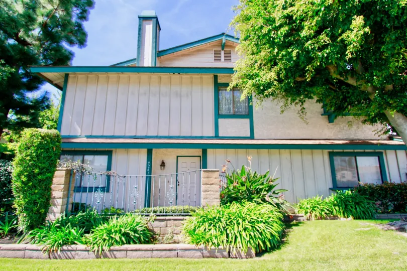 A sunny day in the Cambria town homes surrounded by trees.