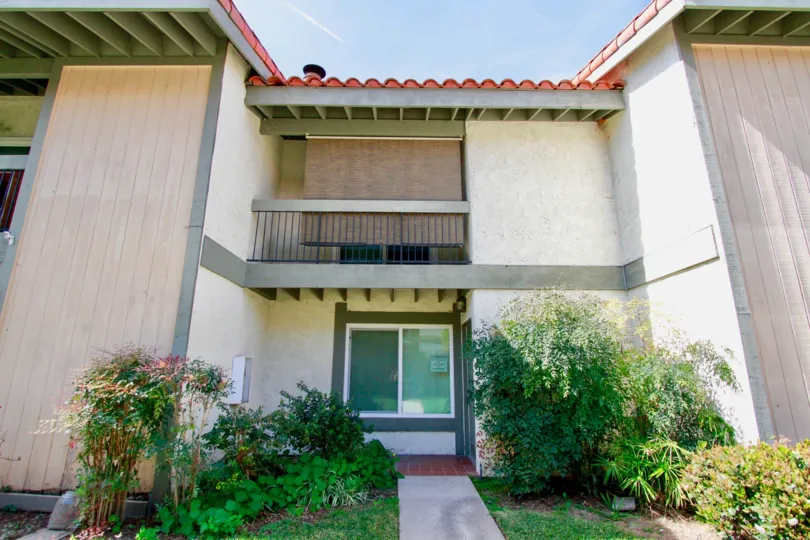 The entrance to a unit in the Cypress College Townhomes on a sunny day
