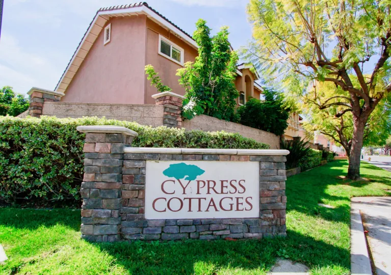 A suuny day in the cypress cottages with a warm greenery view.