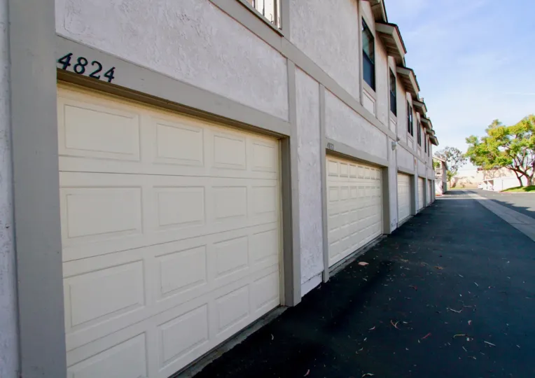 A sunny day at the back door of some house in the Influential Townhomes community.