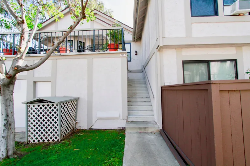 Enjoy the beautiful porch of this home located in the Cypress, California community Influential Townhomes