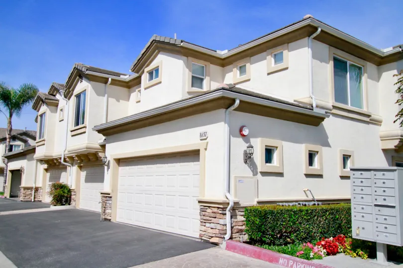 A HOUSE THAT LOCATED IN THE RUSH AREA AND THE CURRENT BOX LOCATED AT OUTSIDE AND THE PLANTS ALSO NEAR TO THERE AT THE MORNING TIME