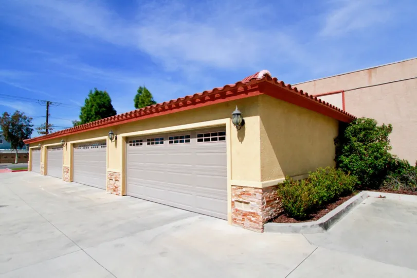 Lourdes Court Cypress California linear red bordered roof and dark plants attracts everyone