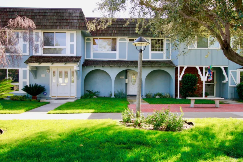 Blue homes with a light fixture in Cypress, California.