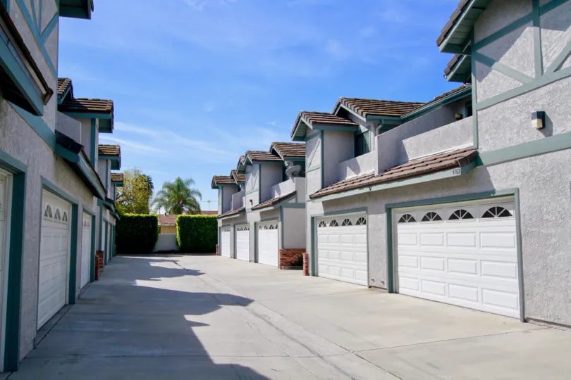Tudor Commons cypress California grey colored dark building arranged in straight line