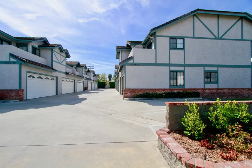 Tudor Commons cypress California blue color painted building blocks with shining windows