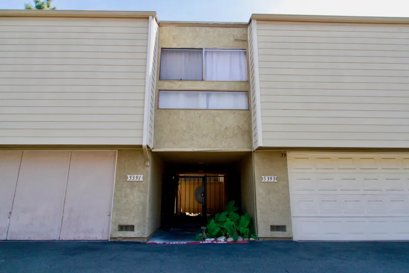 A BUILDING WITH TWO FLOOR SHOPS AND THE GROUND FLOOR ENTRANCE ALSO AVAILABLE AND LOOK SANDAL COLOR AT THE MORNING TIME