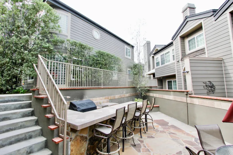 A great day in the Bluffside Villas with chairs and table.