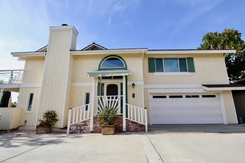 A Villa in Camino Heights has Two stairs for single way with flower pot
