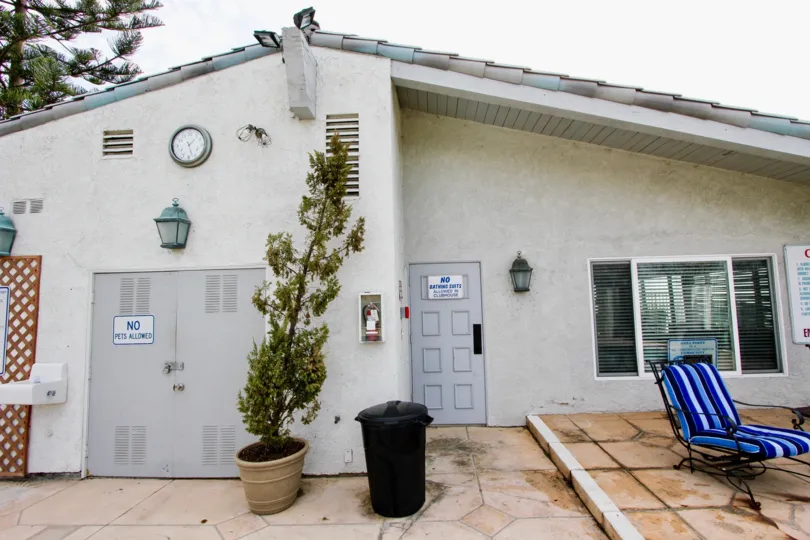 a warm day in the dana bluffs with house that has roof on top and clock, light