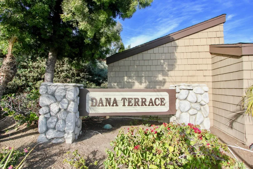 At the Entrance of Dana Terrace has wood board mentioned Dana Terrace