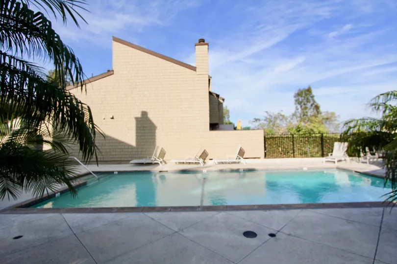 There is no peoples in Pool, only has plants and chairs in Dana Terrace