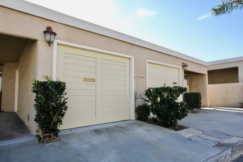 a warm day in the monarch bay villas with house that has door on sandle and 2 lights