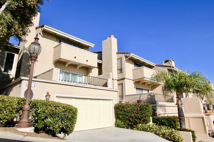 Side view with garage and Veranda of Monarch Bay Villas community, Dana Point, CA