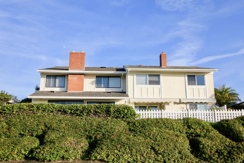 Clear sky with small garden in front of Niguel Shores community, Dana Point, CA