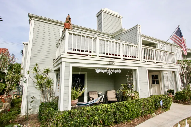Flag is hanger at the balcony of house in Pilgrims bluff
