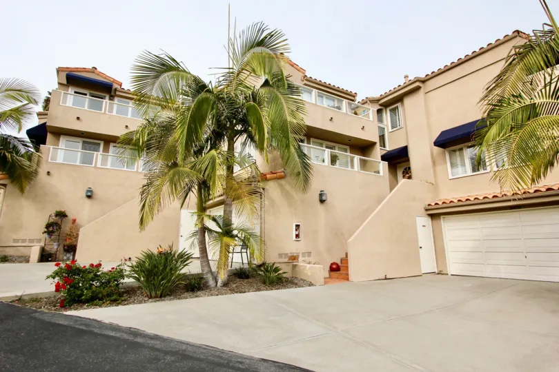 a warm day in the point vista with house that has glass window and parking door