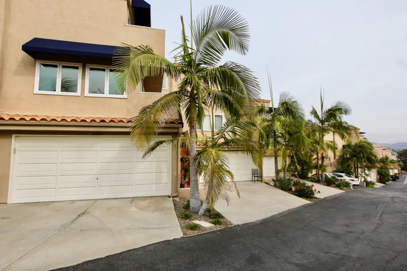 a warm day in the point vista with house that has close parking door and glass windows