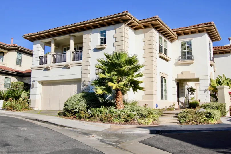 Pointe Monarch community front driveway with trees, Dana Point, CA