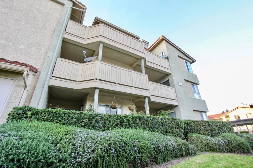 a pleasant day in the ritz pointe with a building of two floor and has adish antenea in the first floor and garden in front